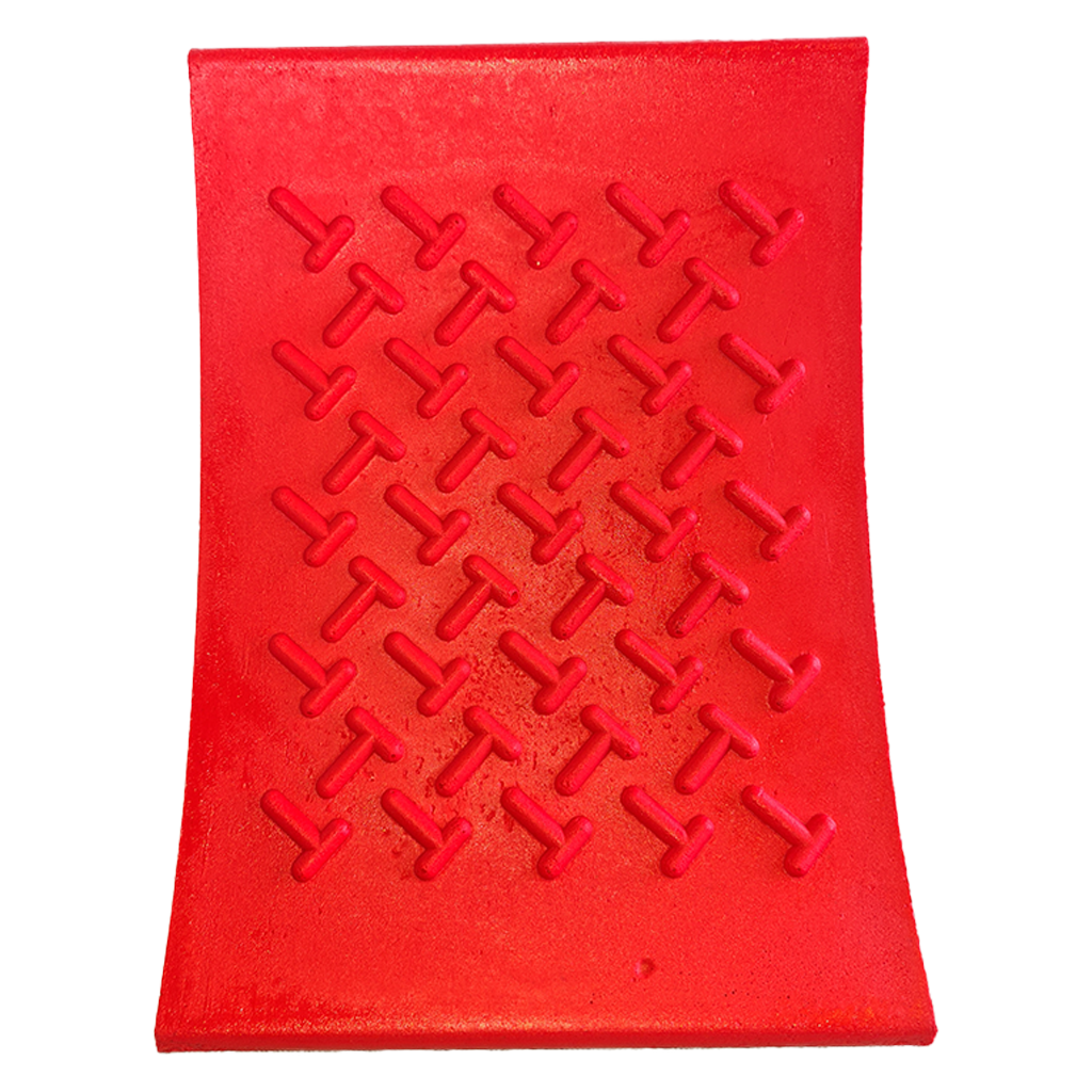 Redfoot Levelling - A Redfoot Levelling Super Chock, a red piece of plastic with a design on it that can be used as outrigger pads for boom trucks.