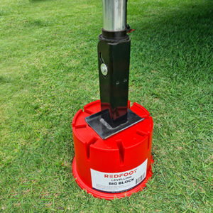 Redfoot Levelling - A red container on the ground.