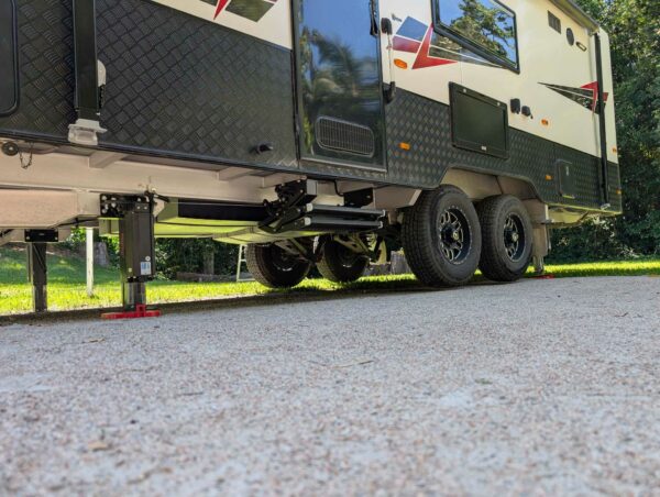Caravan being jacked up by the AutoLift system