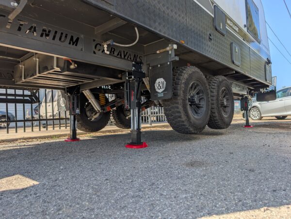 Caravan being levelled by AutoLift system